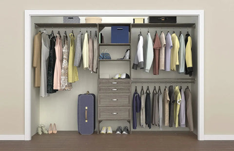 Kick Your Closet Cleanup Into High Gear With This Sturdy Wood System Featuring Four Slide Out Drawers Flexible Shelving And Three Expandable Rods That Honestly Maximizes Every Inch In Sleek Graphite Grey in a closet setup with clothing and shoes.