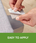 Hands peeling backing from Beige Felt Pads For Furniture 4 X 6 Inches Self Stick Chair Leg Protectors For Hardwood Floors Easy To Apply Scratch Dent And Nick Protection For Tables Couches Stands And Plants