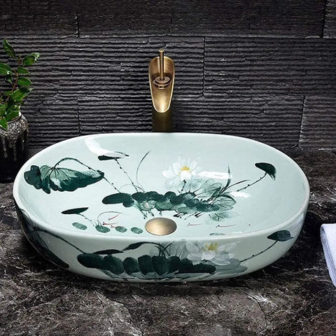 Super Chic Oval Above Counter Bathroom Vanity Vessel Sink Premium Porcelain Ceramic Washbasin with floral design, 57 by 39 cm.