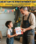 Father and son in workshop exchanging gift marked 'Best Dad' in garage with power tools and pegboard in background