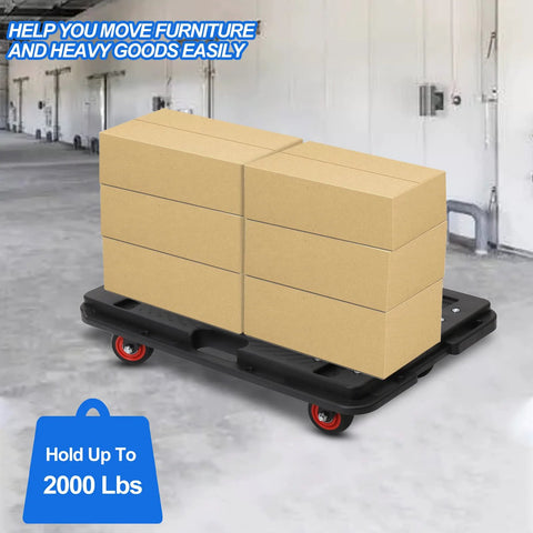 Interlocking Flat Dolly Set With 360 Degree Wheels For Heavy Furniture, black dolly holding boxes in a warehouse setting.