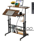 Mobile Standing Desk With Adjustable Height Rolling Desk Stand Up Station For Home Office Portable Laptop Desk On Wheels With Charging Station Rustic Brown featuring a laptop, plants, books, and a built-in charging station.