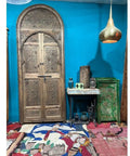 Decorative wooden door with intricate carvings, rustic look, beside table and rug, Hand Crafted Barn Door With Rustic Antique Look Made To Order Solid Wood Interior Sliding Or Hinged Door In Custom Sizes No Glass Or Hardware Included Farmhouse Vibe Boss Built To Last.