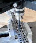 Vertical Drill Press With Tapping Function for Home Shop Use, showing precise tapping on metal, flexible arm in view.
