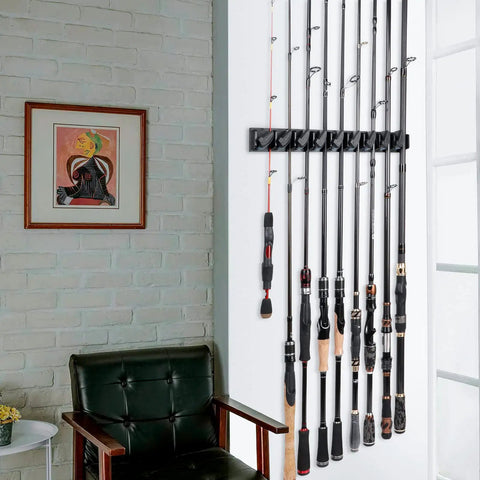 Two Pack Vertical Fishing Rod Rack Wall Mounted Holder That Stores Up To Eighteen Rods Or Combos Fits Most Rod Diameters From 0.12 To 0.75 Inches Perfect Garage Storage For Fishing Gear And A Dope Gift For Men installed on wall with rods.