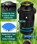 Close-up of adjustable spray lawn sprinkler with rotating head and tabs for spray coverage adjustments