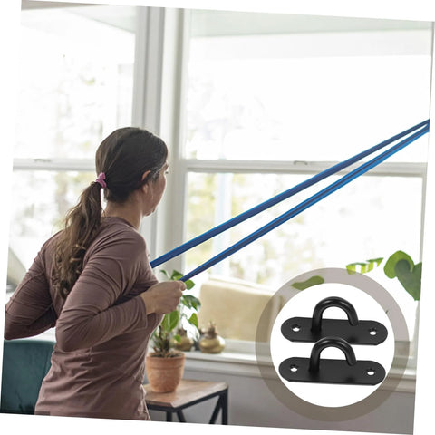 Woman using resistance bands connected to stainless steel wall mount exercise strap anchors 3 pack for resistance bands heavy duty safety