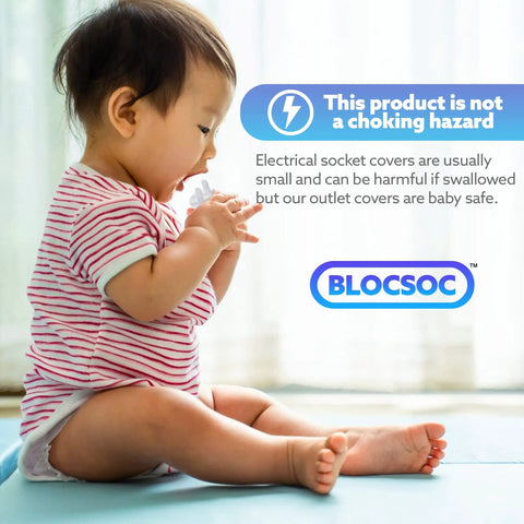 Baby holding an outlet cover with text about safety, sitting on a soft surface; Three Pack Baby Proofing Outlet Covers For Safe Electrical Outlets Easy Install No Choking Hazard Keeps Tiny Fingers Out Of Sockets And Prevents Electrocution Kid Safe.