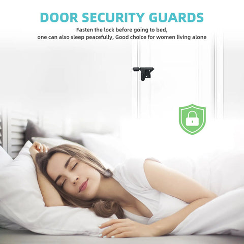 Black Heavy Duty Slide Bolt Latch Tough As Nails Security Gate Lock For Outdoor Fences Garden Sheds Barn Rust Proof Door Hardware Stainless Steel 4 Inches Wide shown securing a door at night.
