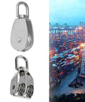 M15 Double Pulley Block Stainless Steel Heavy Duty Hardware Double Wheel Swivel Rigging Lifting Wheel Fixed Pulley for Wire Rope Loading 35kg next to a shipping port view.