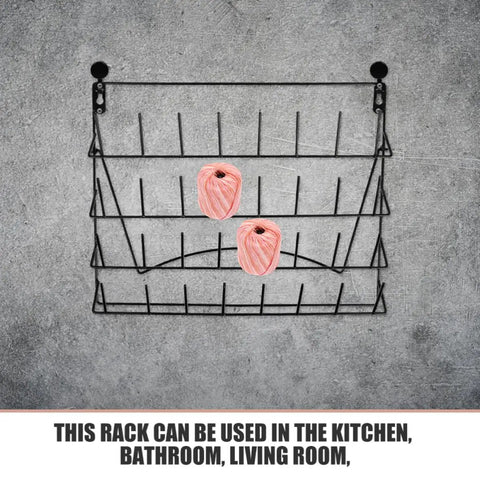 Kick Your Countertop Chaos Out The Door With These Straight Sturdy Metal Wall Racks Featuring Hella Spacious Bottle Display Shelves For Kitchen Bathroom Decor And Space Saving Storage. Black metal wall rack displaying yarn.