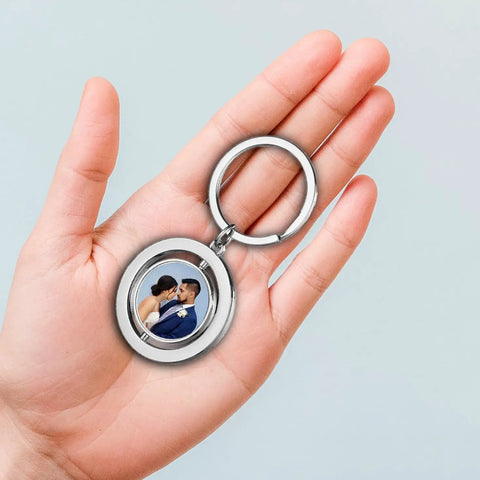 Close-up of Eight Pack Diy Friendly Sublimation Keychains Blank Key Chains Heat Transfer Double Sided Print Key Ring in hand.