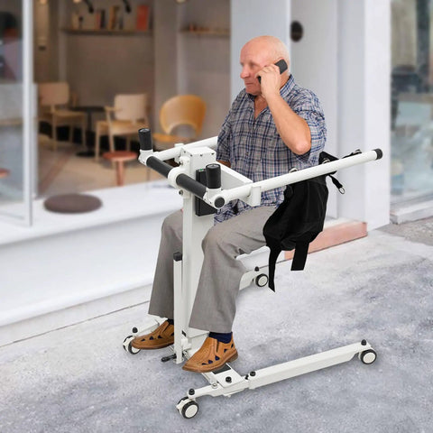 Rock Solid Electric Patient Lift Transfer Chair With Adjustable Height And Seat Width Foldable Wheelchair Mobility Aid For Seniors with a man on phone.