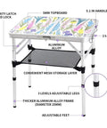 Foldable Camping Table 24 By 16 Inch Surface With Adjustable Heights 10 19 And 24 Inches Lightweight Aluminum Table With Carry Handle For Outdoor Indoor Use Perfect For Camping Beach BBQ And Hiking Floral Style showing mesh storage and adjustable legs.