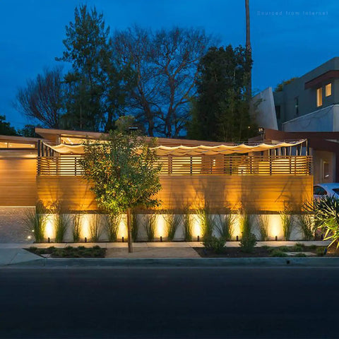 Night view of garden with pathway lights highlighting 12-Pack Low Voltage Landscape Wire Connectors for Outdoors, weatherproof setup