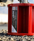 Magnetic RV Jack Stabilizer Blocks Four Pack, Fold Flat Leveling Pads For Trailers Hold Three Tons Each With No Sweat Setup And Ridiculously Roomy Canvas Tote Bag on rocky ground.
