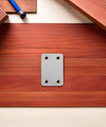 Stainless Steel Shelf Brackets 48 Pack With Four Holes Flat Plate on wooden surface for home upgrades, built tough.