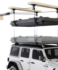 Garage Ceiling Storage Lift System For Roof Top Tent Hoist Heavy Duty Overhead Pulley 4 Point Lift 250lb Capacity Adjustable Straps Fits 8 To 16 Ft Ceiling Great For Kayaks Tents And Bulky Gear lifting a rooftop tent from an SUV