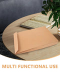 Kraft Self Seal Mailing Envelopes 238x335x40mm with double sided adhesive tape on a table for shipping documents.