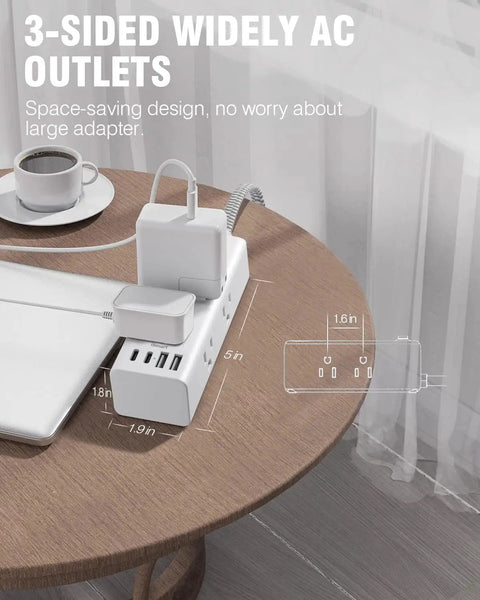 Ultimate Desktop Power Strip With 6 Outlets And 4 USB Ports Including 2 USB C Fast Charge Ports on a round wooden table