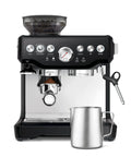 Barista Grade Espresso Machine With Integrated Conical Burr Grinder Bean To Cup Coffee Maker Featuring Manual Steam Wand For Creamy Microfoam And Show Stopping Latte Art In Modern Black Truffle Finish with milk frothing pitcher.