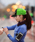 Woman wearing Unisex Fluorescent Green Trucker Hat With Anti Sweat Band No Crying On The Yacht Style Golf Cap as she jogs on street.