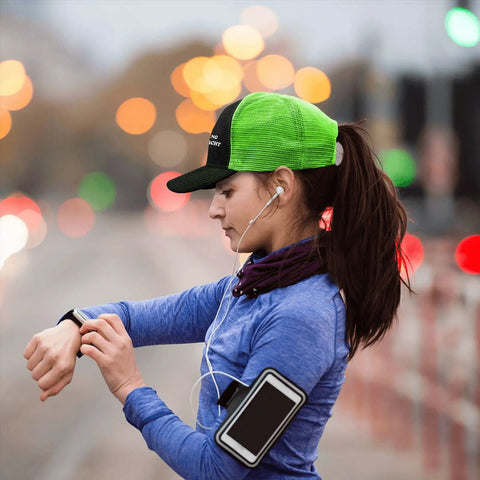 Woman wearing Unisex Fluorescent Green Trucker Hat With Anti Sweat Band No Crying On The Yacht Style Golf Cap as she jogs on street.