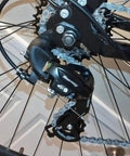 Rear Derailleur RD TY300 SGS 6 To 7 Speed Hanger Mount on bike frame, close-up view of black derailleur mechanism