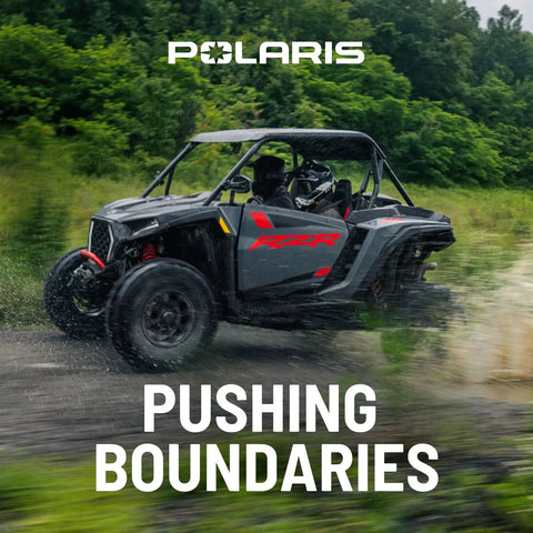 Top Shelf Polaris Linkage Assembly For RZR Stabilizer Bar OEM 1542304 side by side vehicle navigating off-road terrain.