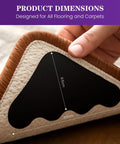 Hand holding 16Pcs Non Slip Rug Grippers With Triangular Design For Hardwood Floors And Carpet Tape For Area Rugs Keeps Rugs In Place