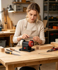 Heavy Duty Mini Bench Grinder Packed With Dual Grinding Wheels For Sharpening And Deburring Compact Tabletop Sander in workshop.
