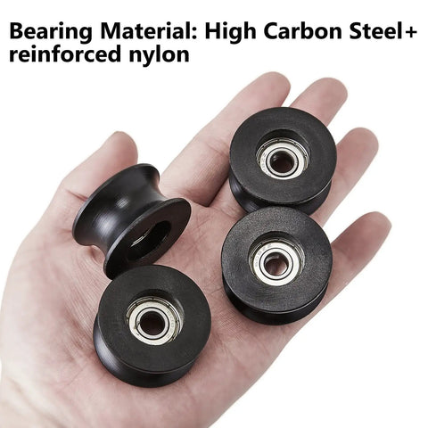 Hand holding 4 Pack U Groove Pulley Set With 8mm Inner Bore, 40mm Outer Diameter And 20mm Thick Wheel, Ideal For Doors, Windows, And Mechanical Equipment