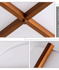 Close-up of wood frame and fabric shade details of Semi Flush Mount Ceiling Light Fixture With Wood And Off White Fabric Drum Shade Modern Chandelier For Bedroom Dining Room Corridor Living Room 4 Light On Trend Cozy Vibe