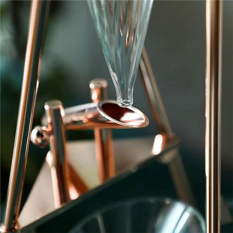 Close-up of the coffee dripping mechanism on the Top Shelf Cold Brew Drip Tower And Ice Drip Coffee Maker With 800Ml Borosilicate Glass Carafe.