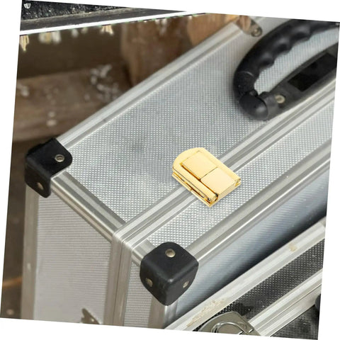 Golden zinc alloy toggle latch displayed on a metal case. Retro Iron Toggle Latch Kit For Wooden Chests Jewelry Boxes And Cabinets 5 Piece Secure Clasp Easy Install Comprehensive DIY Hardware Set For Craft Projects And Vintage Style Boxes.