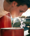 Heavy Duty 1/2 Inch Industrial Water Faucet Fountain Bubbler in use, featuring a boy drinking from chrome tap.