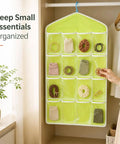 Smooth Over Door Shoe Hanging Storage Bag With Sixteen Clear Pockets For Fast Closet Setup And Hassle Free Dorm Room Essentials Total Game Changer Flex hanging in green, organizing hair accessories and socks.