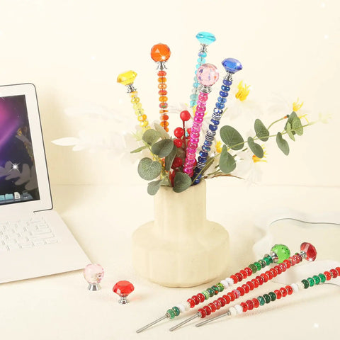 300 Piece Killer Quality Fairy Garden Stake Kit With Brilliant Crystal Diamond Tops And Stainless Steel Threaded Rods in flower vase.