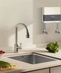 Slick 4000W Tankless Mini Electric Water Heater Featuring Constant Temperature Technology And Convenient Wireless Remote Control Plus Badass Abs Design For Quick Daily Use, installed under kitchen sink.
