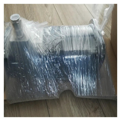 Integrated Stepper Motor ILS1U851PB1A0 wrapped in plastic, black metal housing with shaft for industrial automation