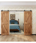 Installed Sliding Barn Door Hardware Kit 4Ft To 20Ft Rail System For Double Wood Doors with T Style Rollers in farmhouse bedroom