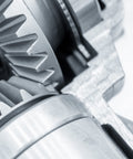 Close-up of Beefy 45 Steel Tapered Bevel Gear Wheel 1.5 Modulus 20 Teeth 10mm Bore Silver Finish in industrial setup.