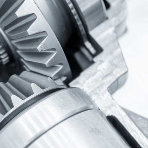 Close-up of Beefy 45 Steel Tapered Bevel Gear Wheel 1.5 Modulus 20 Teeth 10mm Bore Silver Finish in industrial setup.