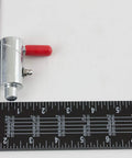Heavy Duty Rock Solid 1/2 Inch Spring Loaded Cam Lock With Twist Lock Plunger Pin Grip Tight For Wrecker Tow Trucks And Heavy Farm Implements Zinc Plated Steel 2 Pack with red handle seen with ruler.