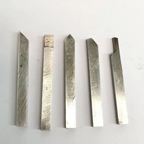 Heavy Duty Five Piece 4X4MM Carbide Lathe Cutter Bits in a row, 4mm square metal tools, suitable for compact lathes.