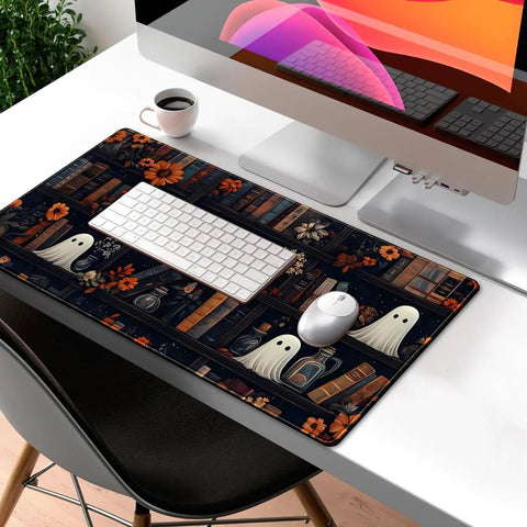 Cute Vintage Gothic Desk Pad XXL Mouse Pad For Large Desks on workspace with white keyboard and mouse, bookcase pattern