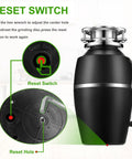 Detailed view of 3/4 HP Quiet Garbage Disposal For Home Kitchens reset switch and hole