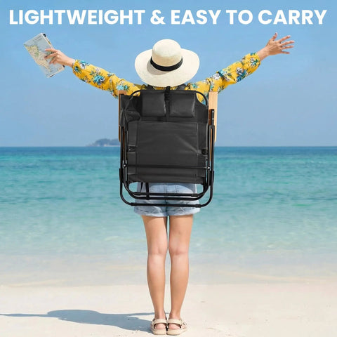 Person carrying Two Pack Portable Beach Chairs For Adults, Lightweight Outdoor Camping Chairs with Backpack Carry on a beach.