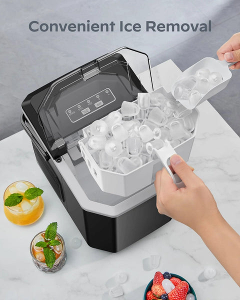 Front view of a black Silonn countertop ice maker with a transparent lid, white ice basket full of ice cubes and scoop