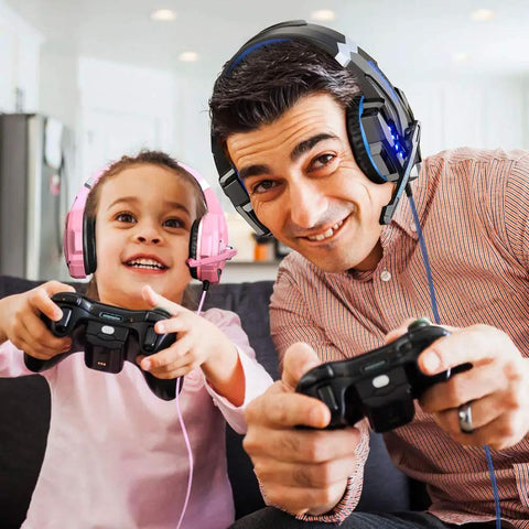 Father and daughter gaming with Multi Platform Gaming Headset With Noise Cancelling Mic 7.1 Surround Sound LED Lights
